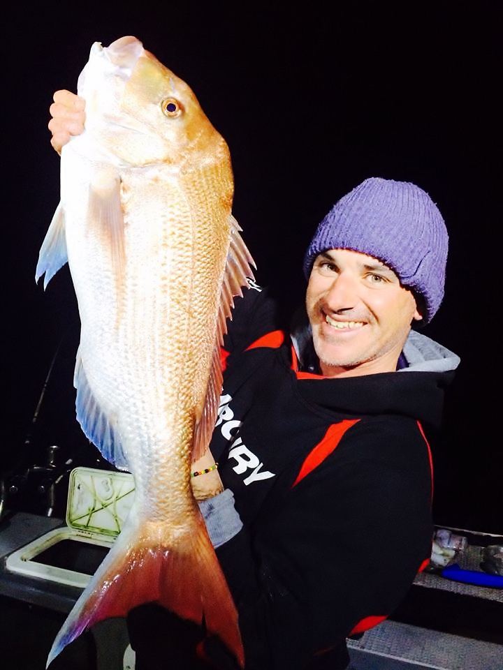 Matt Cini with a night snapper on the boat